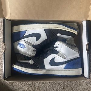 White blue and black Jordan1s size 12